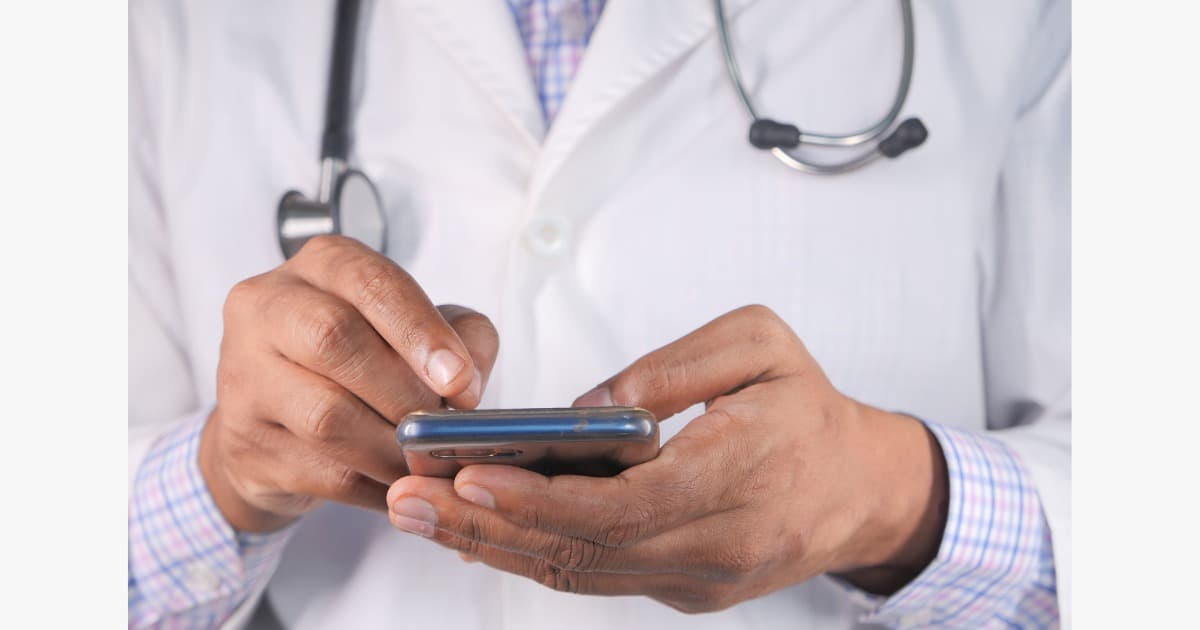 Caring hands, representing trustworthy clinical guidance any hour